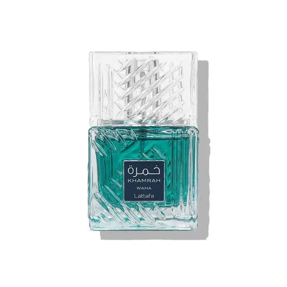 Teal perfume bottle with decorative glass design on a white background