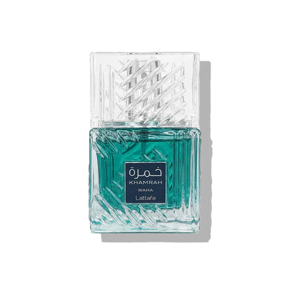 Teal perfume bottle with decorative glass design on a white background