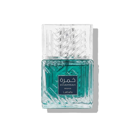Teal perfume bottle with decorative glass design on a white background