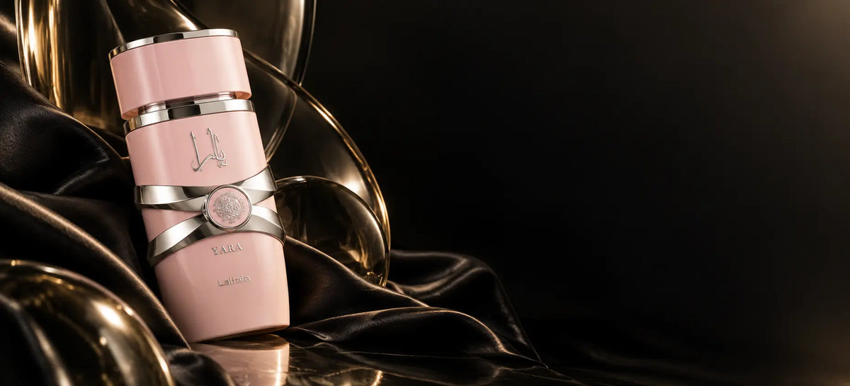 Yara by Lattafa on black satin with gold glass, desktop fragrance story