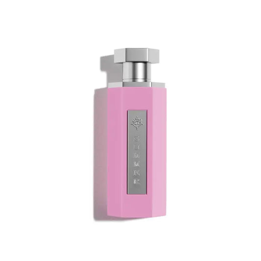 Pink perfume bottle with silver cap on a white background Reef Perfumes